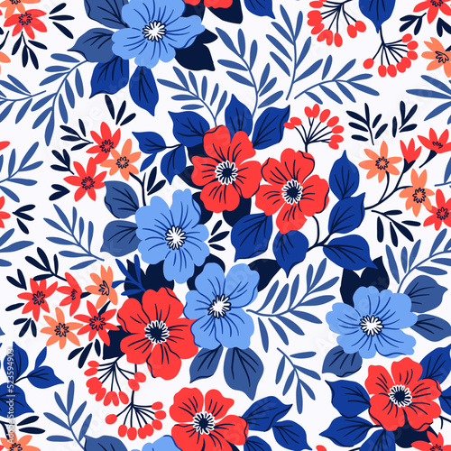 Trendy seamless vector floral pattern. Endless print made of small red and blue flowers. Summer and spring motifs. White background. Stock vector illustration.
