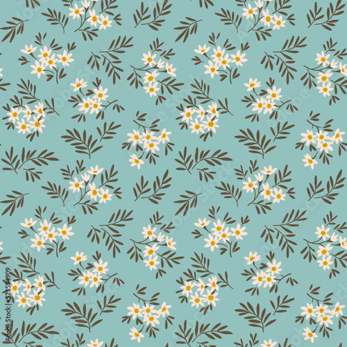 Trendy seamless vector floral pattern. Endless print made of small white flowers. Summer and spring motifs. Pastel blue background. Stock vector illustration.