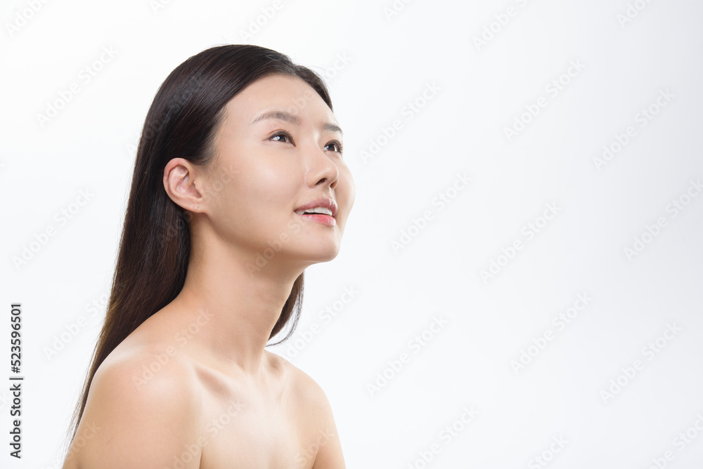 Asian woman portrait on white background, face care, face care, facial treatment, cosmetology, beauty and spa Asian woman portrait on white background, face care, face care, facial treatment, cosmetology, beauty and spa