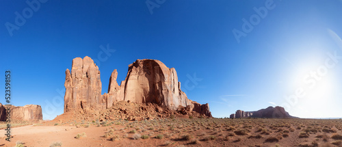 Desert Rocky Mountain American Landscape. Sunny Morning Sunrise. Oljato-Monument Valley, Utah, United States. Nature Background Panorama.