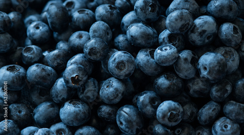 Blueberries on a market. Background of scattered blueberries.