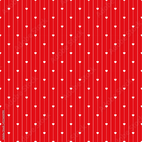 White heart on red background.