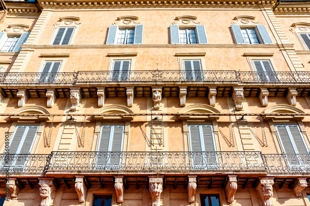 Fototapeta premium Facade of old Renaissance residential buildings at the Campo square in Siena, Tuscany, Italy, Europe