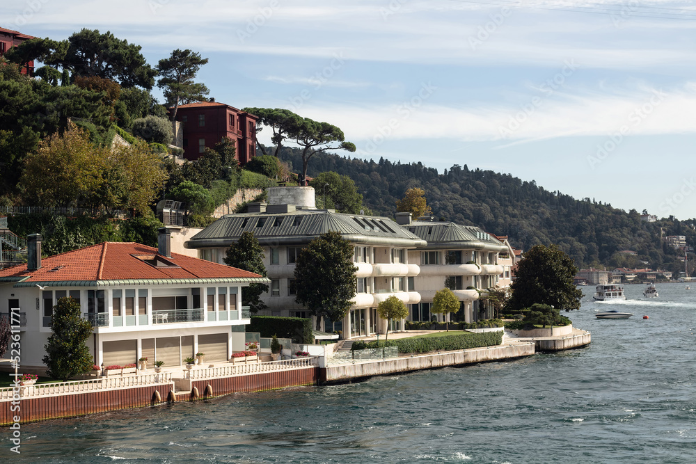 View of mansions by Bosphorus in Kandilli area of Asian side of Istanbul. It is a sunny summer day. Beautiful scene. View of mansions by Bosphorus in Kandilli area of Asian side of Istanbul. It is a sunny summer day. Beautiful scene.