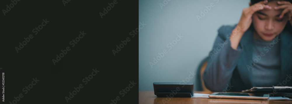 Fototapeta premium Stressed businesswoman,Frustrated and upset in business pressure and overworked at office. Asian female working on laptop, feel tire and headache. Stressed and Frustrated concept-