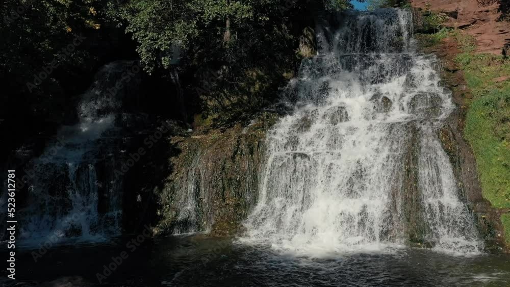 Waterfall in forest. Video recording, close-up, slow motion. Western part Ukraine, Ternopil region, Dzhurinsky Chervonogorodskiy waterfall. Mountains in forest, river. Amazing view nature Europe Waterfall in forest. Video recording, close-up, slow motion. Western part Ukraine, Ternopil region, Dzhurinsky Chervonogorodskiy waterfall. Mountains in forest, river. Amazing view nature Europe
