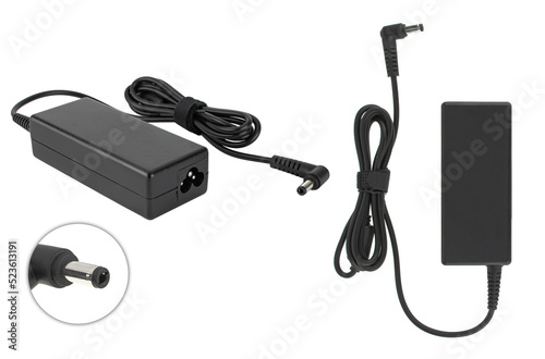 laptop power adapter, laptop accessory, on white background photo