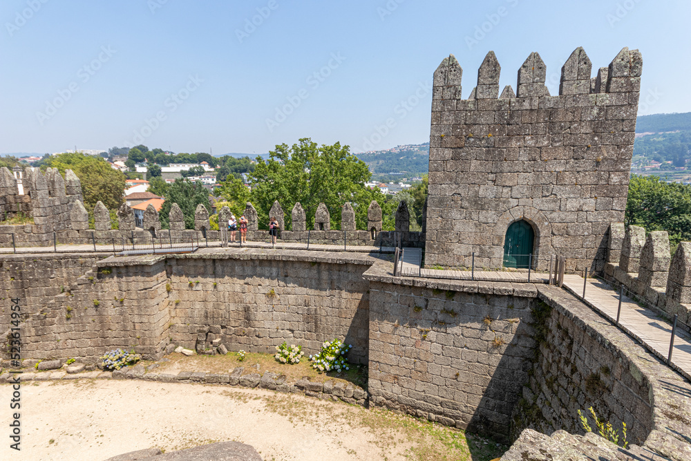 Fototapeta premium Guimaraes, Portugal. The Castelo de Guimaraes (Guimaraes Castle), 10th century medieval castle