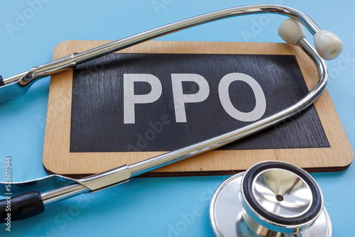 Plate with abbreviation PPO preferred provider organization or health insurance plan. photo