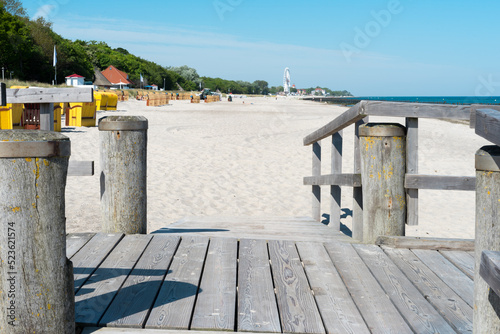 Fototapeta Naklejka Na Ścianę i Meble -  Bathing jetty on the Baltic Sea on a sunny summer day early in the morning. The sea and the sky are wonderfully blue