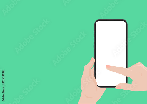 Mobile phone mockup with a white, blank screen on a green background. A person's hand is holding a smartphone. Vector image.