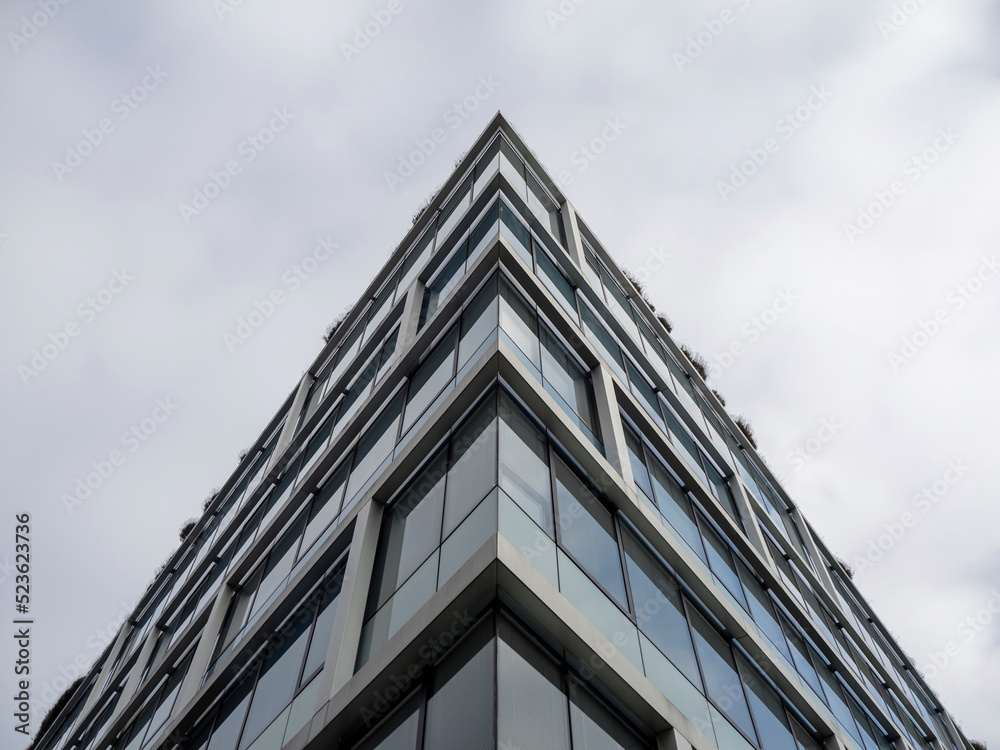 Symmetrical building seen from below with triangular perspective. Sharp building Symmetrical building seen from below with triangular perspective. Sharp building