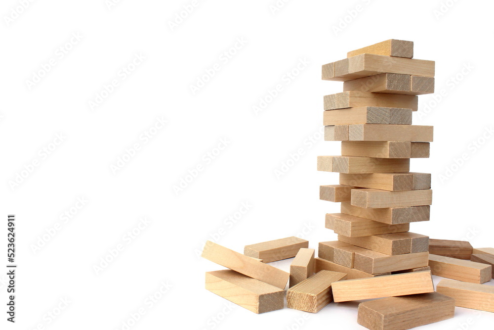 Wooden toy for building a tower with small blocks.