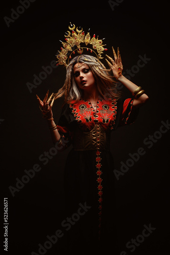 Canvas Print Ethnic dancer wearing gold crown and dreadlocks, in trance