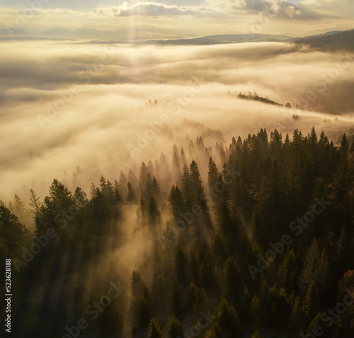 Sunset over the mountains in the Carpathians. Aerial drone view. © Ryzhkov Oleksandr