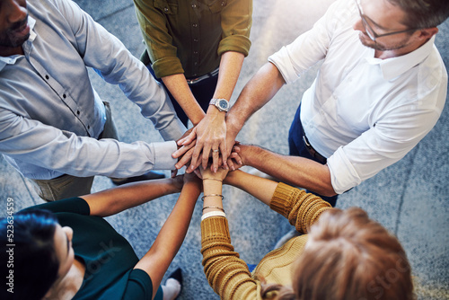 Canvas Print Teamwork, hands in a huddle and working together with a team or group of business people and colleagues standing in the office
