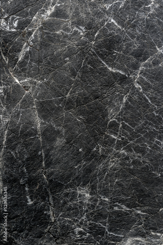 Dark grey black slate background or texture. stone background. vertical.	                        