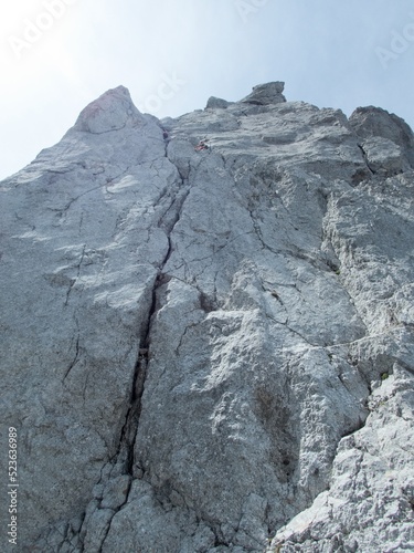 mountain rock cilmbing in wilder kaiser gebirge in austria photo