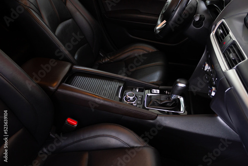 Car interior. Salon of a new modern car. Auto seats. © Brylynskyi