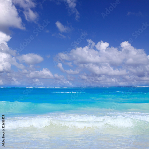 Fototapeta Naklejka Na Ścianę i Meble -  Travel background with Caribbean sea and clouds sky.