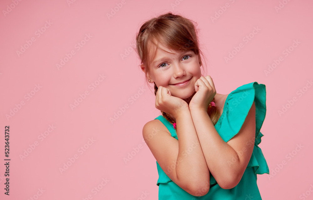 Portrait of cute toddler girl child with two funny pigtails over pink background. Advertising childrens products. Funny face Portrait of cute toddler girl child with two funny pigtails over pink background. Advertising childrens products. Funny face