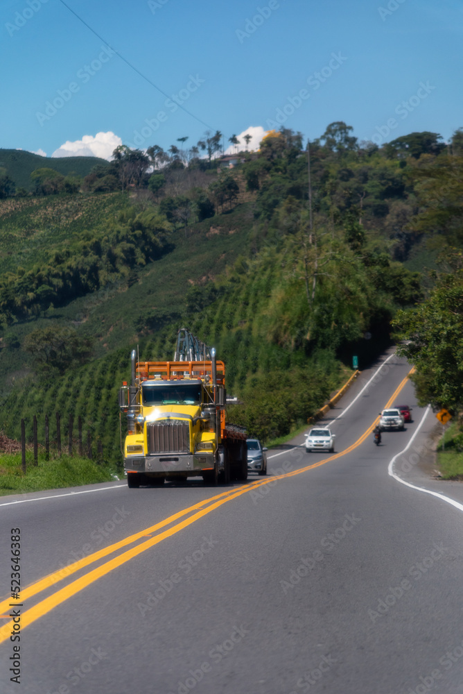 Yellow truck on a rural road in Colombia