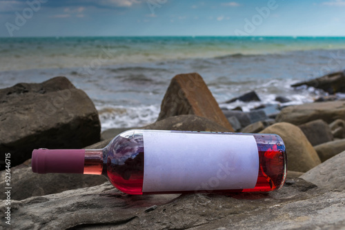 Bottle of wine by the sea
