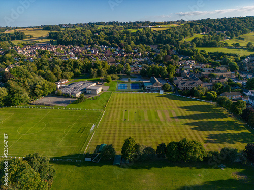Aerial view of West Yorkshire village of Pool-in-Wharfedale shot by drone.