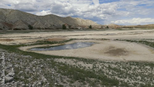Aerial-Record drought reduces this reservoir to historic low levels as migrating water fowl search for the water they've been used to during previous migrations