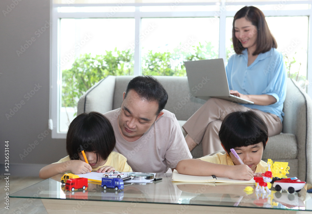 mother father and children in a new home, concept housing a young family. mother father and children in a new home, concept housing a young family.