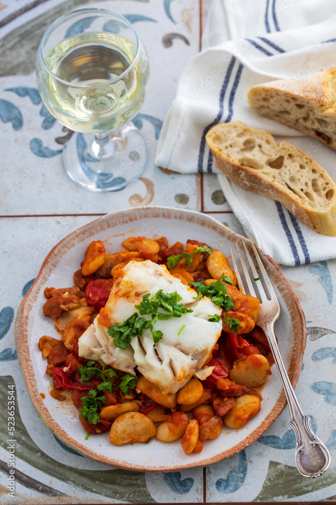Spanish dish of cod with butter beans, tomatoes and chorizo Spanish dish of cod with butter beans, tomatoes and chorizo