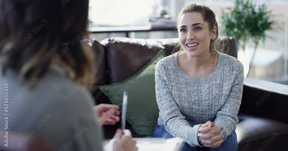 Mental health, healing and support in a therapy session with a smiling woman. Psychologist helping a woman balance her thoughts and life. Hopeful survivor working on inner peace and acceptance
