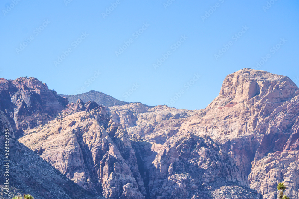Sandy rock mountains with blue skies