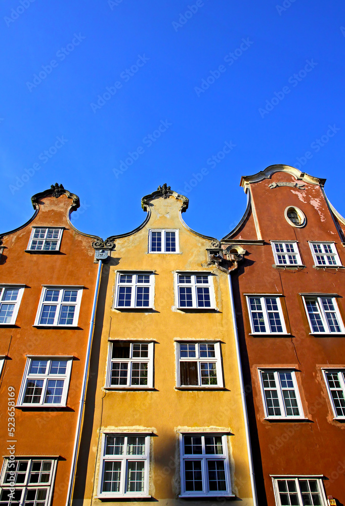 Fototapeta premium Colourful old buildings with blue sky background in City of Gdansk, Poland