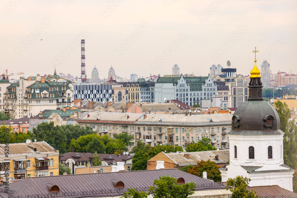 Fototapeta premium beautiful view of summer Kiev. Roofs of Podol and a view of the left bank