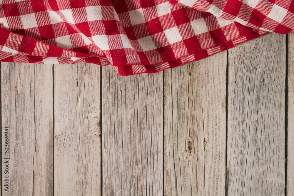 wooden table with red and white checkered tablecloth wooden table with red and white checkered tablecloth