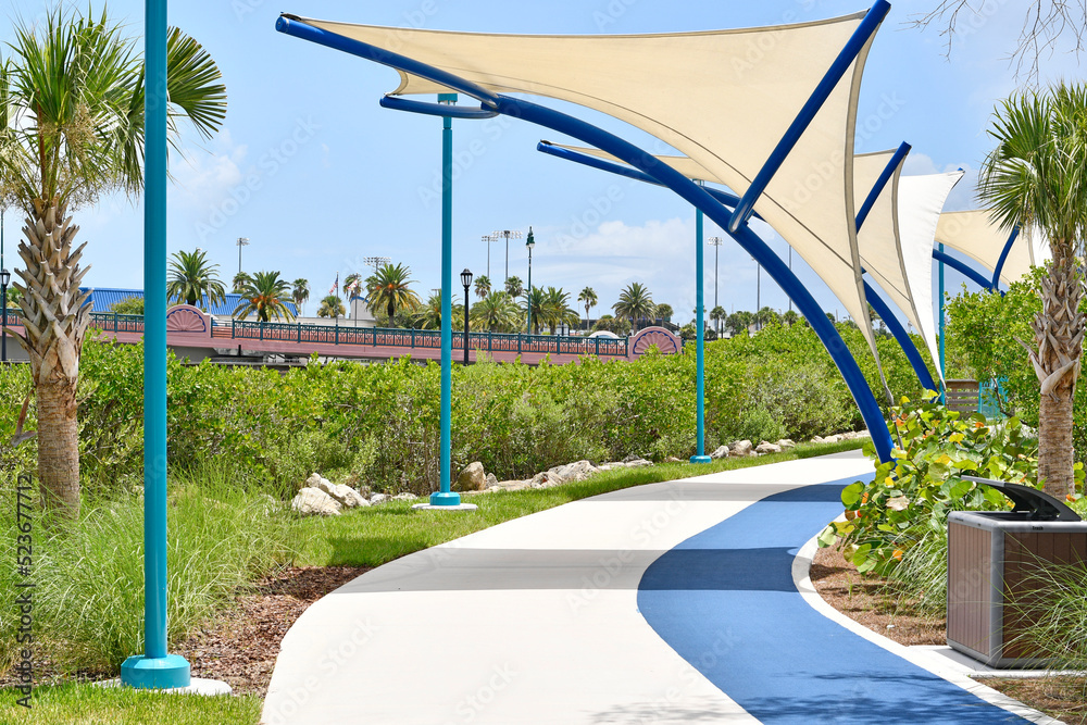 Walking path with sail shades in downtown Daytona Beach Volusia, County Florida Stock Photo