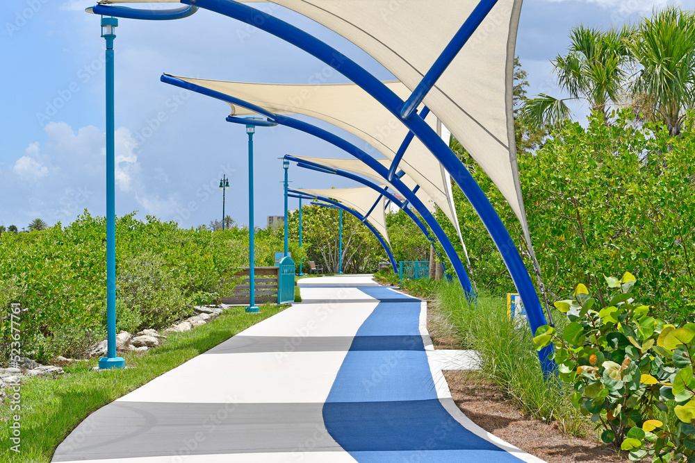 Walking path with sail shades in downtown Daytona Beach Florida Stock Photo Adobe Stock
