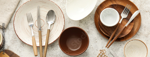 Set of clean dishes and cut...