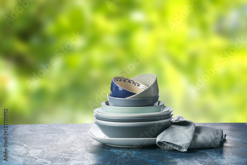 Set of clean dishes with na...