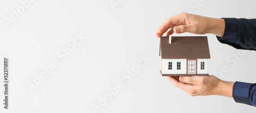 Hands of real estate agent ...
