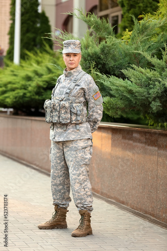 Mature female soldier in mi...