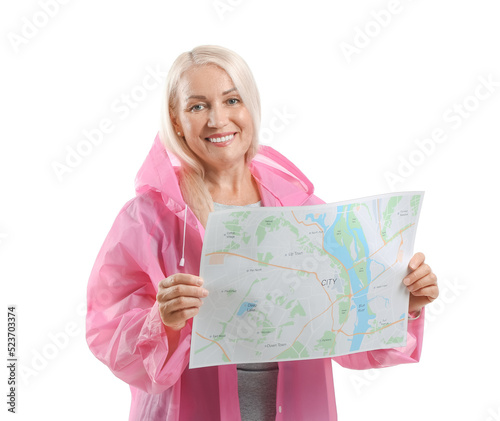 Mature woman in raincoat wi...
