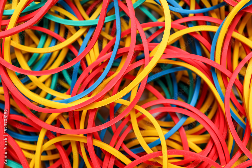 Many colorful rubber bands as background, closeup Many colorful rubber bands as background, closeup