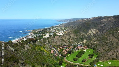 Aerial: Golf course in Laguna Beach, California. 4K cinematic views of land and sea. photo