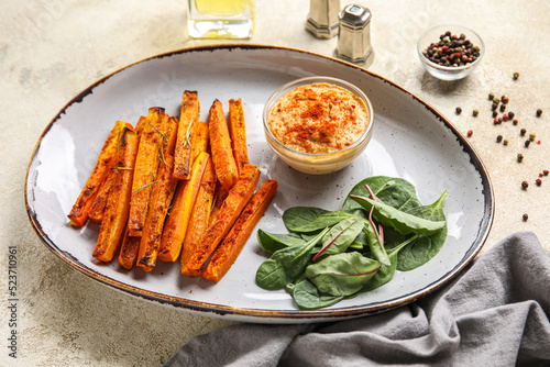 Plate of tasty baked carrot...