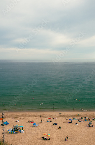 beach and sea - swimmers and sunbathers on Bournemouth Beach (ID: 523713722)
