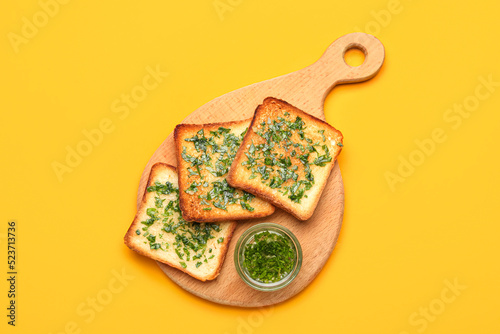 Wooden board of tasty toast...