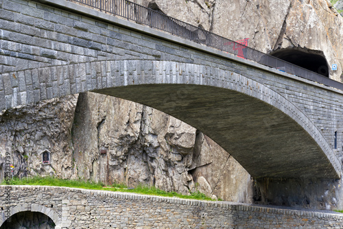 Famous Devil's Bridge at Schöllenen Gorge, Canton Uri, on a sunny summer day. Photo taken July 3rd, 2022, Andermatt, Switzerland.