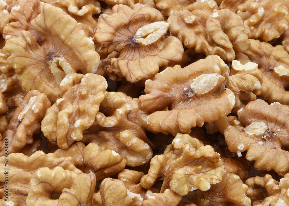 Lot of walnuts background. Food texture concept Lot of walnuts background. Food texture concept